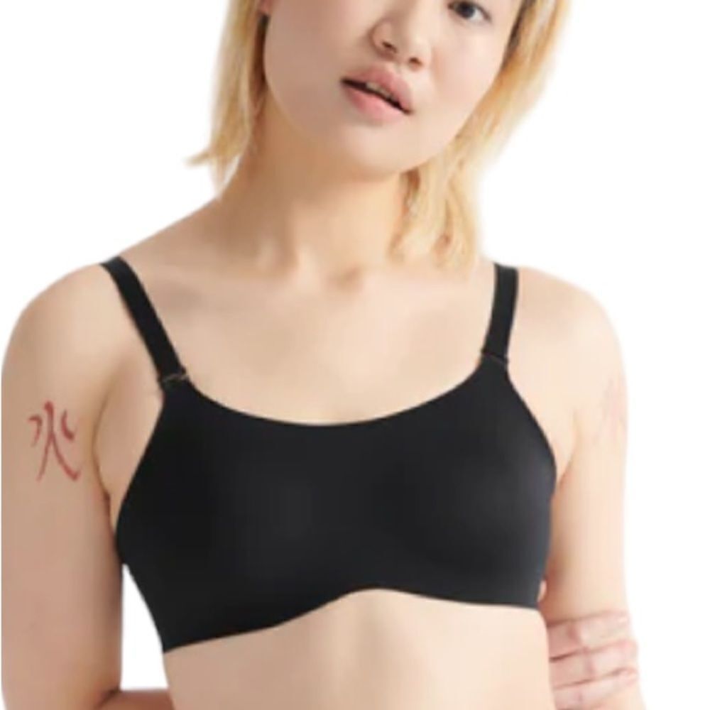 Knix by Knixwear evolution black and beige wireless reversible bra.